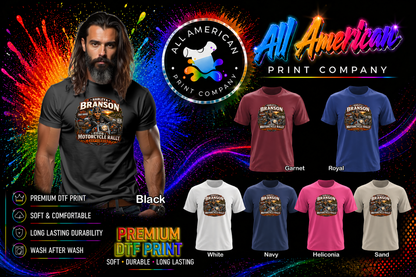 Man wearing a t-shirt with 'Branson H.O.G.' design, surrounded by various colored t-shirts and All American Print Company branding.