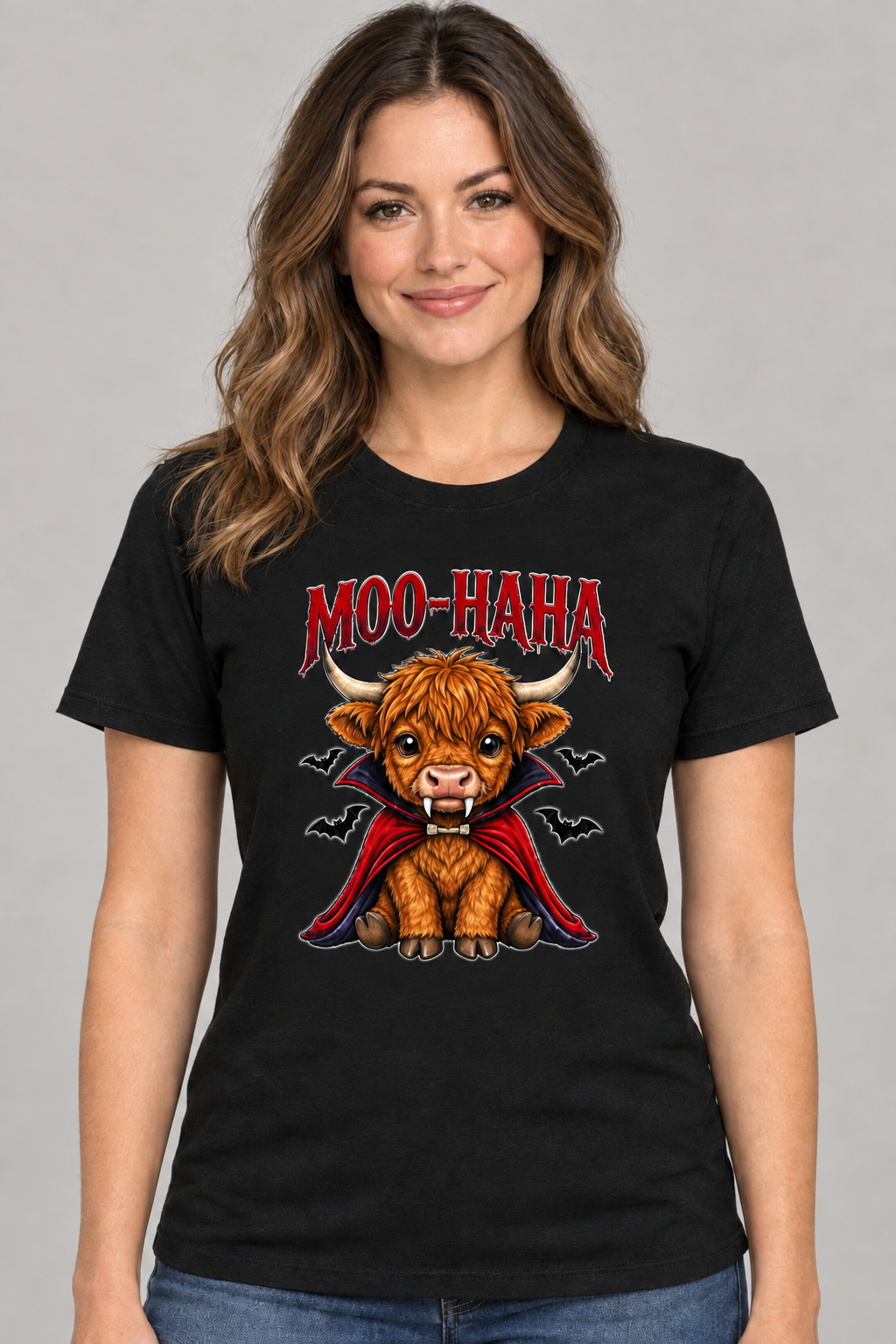 AI-generated model wearing a black Moo-Haha Highland cow Halloween T-shirt with a smaller centered vampire cow graphic